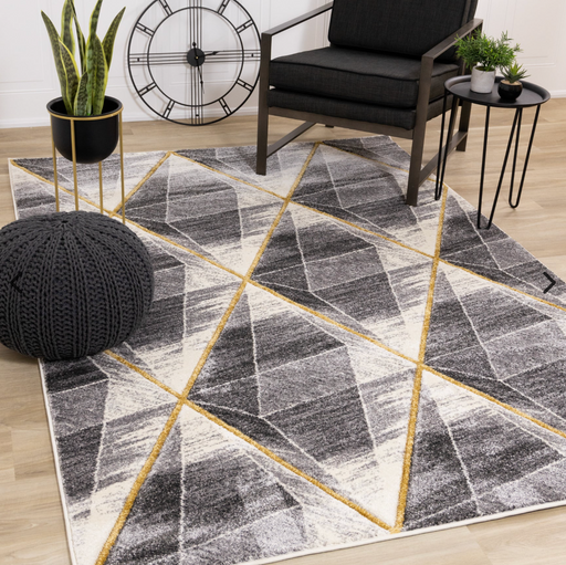 Geometric patterned Soho area rug with grey, black and gold tones