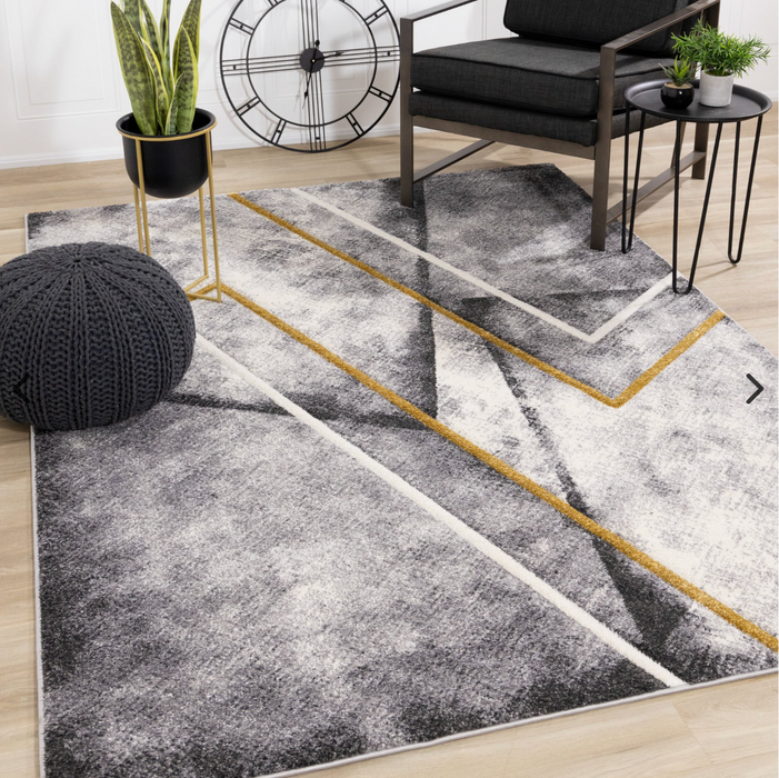 Geometric patterned Soho area rug with grey, black and gold tones