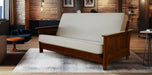 Wooden futon sofa in a living room setting with brick walls and modern decor.