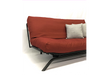 Armless black metal futon with futon mattress and burnt red cover - side view