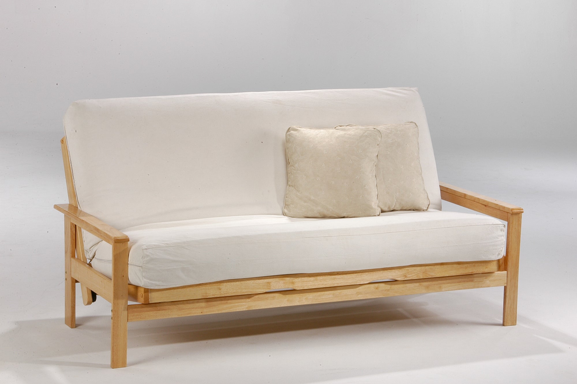 Albany futon frame - natural wood frame with futon mattress and cream coloured fabric