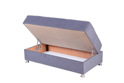Soft grey matching ottoman - tilted open to showcase storage