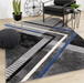 Geometric patterned Soho area rug with grey, black and blue tones