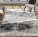 Geometric patterned Soho area rug with grey, black and creamy white tones