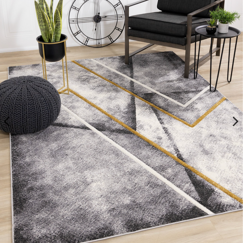 Geometric patterned Soho area rug with grey, black and gold tones