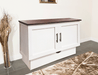 Capered Sleepchest in white with a wood top.  In the closed position in a family room