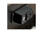 Closeup view of plugin power and USB capability on side of bed